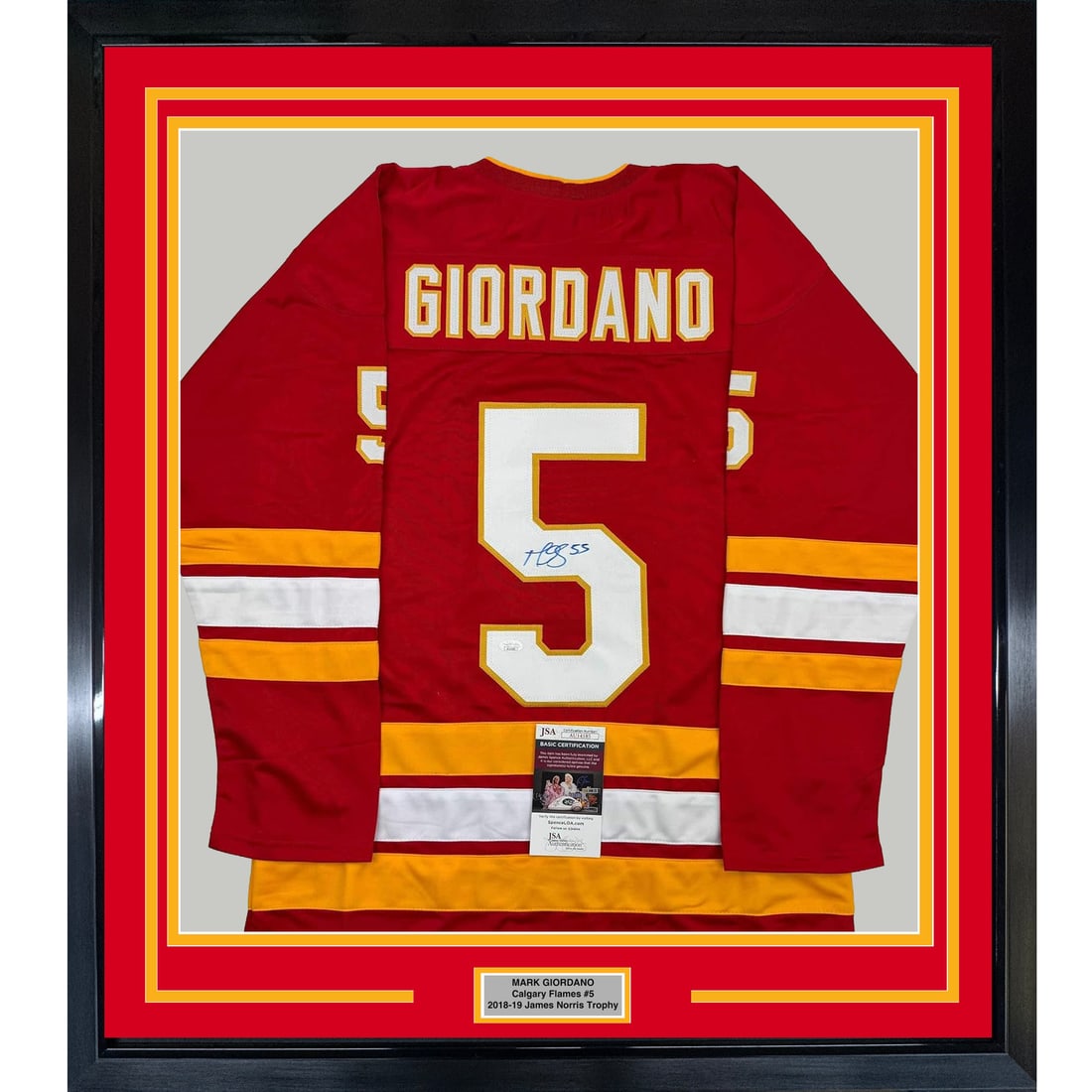 Framed Signed Mark Giordano Calgary Flames Jersey with JSA COA: Framed Signed Mark Giordano Calgary Flames Jersey with JSA COA This professionally framed and autographed Mark Giordano Calgary Flames jersey is a must-have for any hockey fan. The vibrant red jersey 