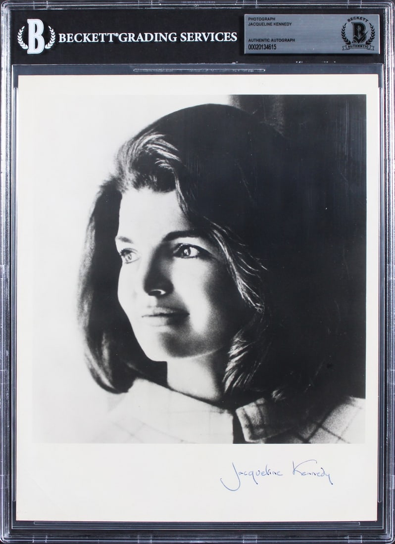 Beckett Slabbed Jacqueline Kennedy Onassis Signed 8x10 Photo: Beckett Slabbed Jacqueline Kennedy Onassis Signed 8x10 Photo This 8x10 black and white photograph has been personally signed by Jacqueline Kennedy Onassis. The autograph is authenticated and encapsula