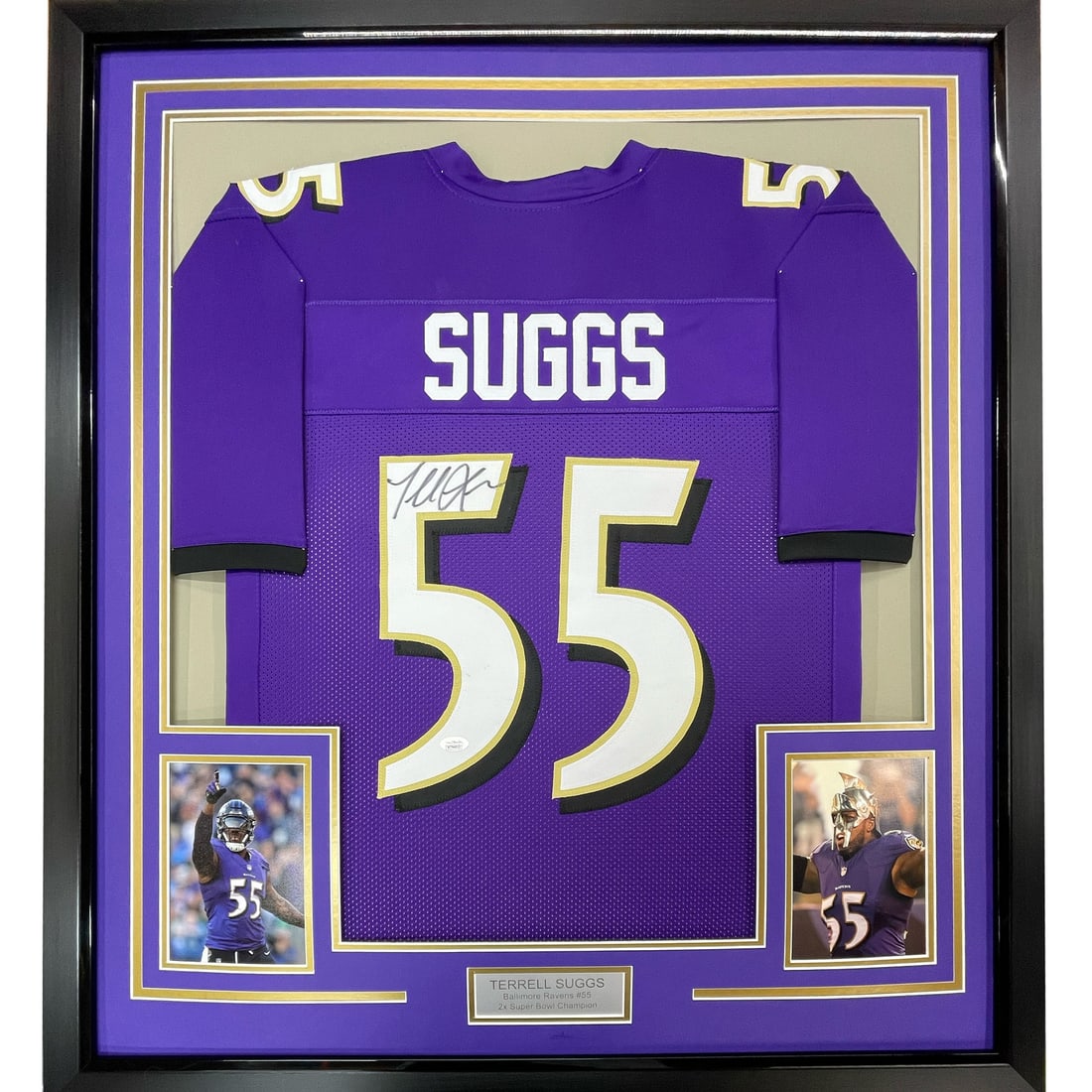 Terrell Suggs signed Baltimore Ravens framed jersey JSA COA 33x42: Terrell Suggs signed Baltimore Ravens framed jersey JSA COA 33x42 This professionally framed and matted Baltimore Ravens purple jersey is autographed by Terrell Suggs. The display includes two 8x10 ph