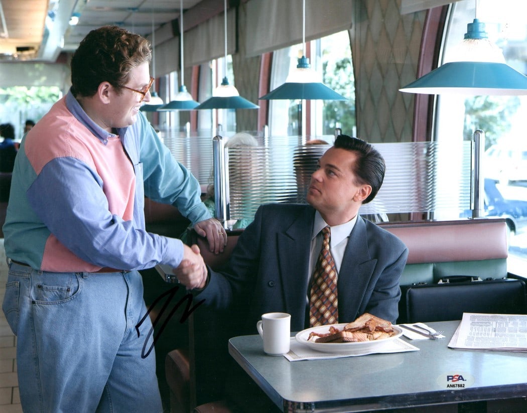 Leonardo DiCaprio Autographed 11X14 Photo Wolf of Wall Street PSA Authenticated: Leonardo DiCaprio Autographed 11X14 Photo Wolf of Wall Street PSA Authenticated This remarkable 11X14 photograph features a signed autograph from the acclaimed actor Leonardo DiCaprio, known for his i