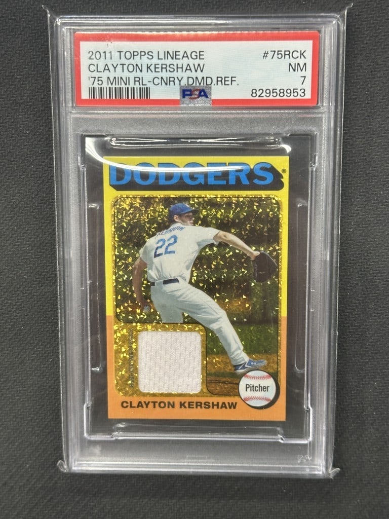 Clayton Kershaw 2011 Topps Lineage Mini Relic Canary Diamond PSA 7 #75RCK: Clayton Kershaw 2011 Topps Lineage Mini Relic Canary Diamond PSA 7 #75RCK This is a 2011 Topps Lineage 75 Mini Relic Canary Diamond baseball card featuring Clayton Kershaw, a standout player for the L