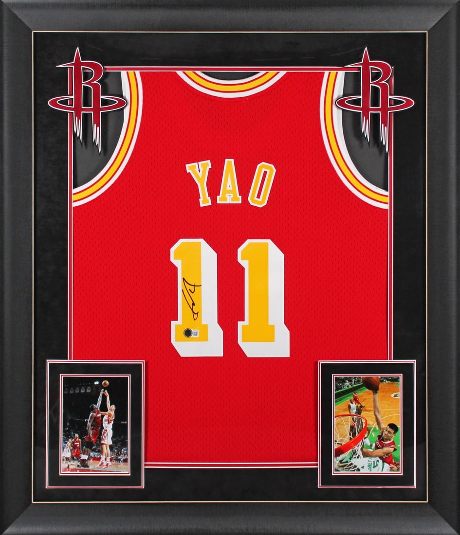 Yao Ming Signed Houston Rockets Framed Jersey 2004-05 BAS Witnessed: Yao Ming Signed Houston Rockets Framed Jersey 2004-05 BAS Witnessed This stunning autographed red Mitchell & Ness 2004-05 Hardwood Classics Swingman jersey features the signature of Yao Ming, the lege