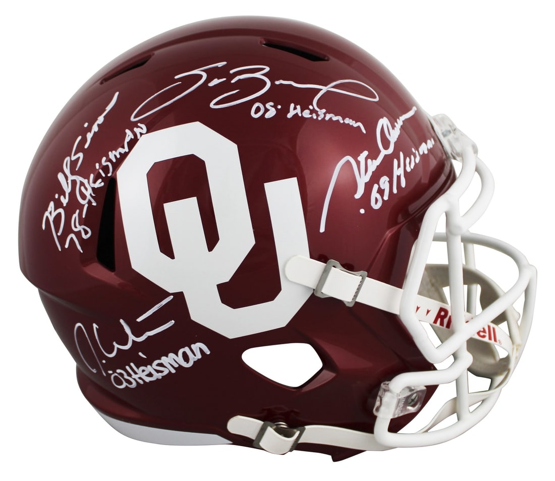 Oklahoma Sooners Full Size Helmet Signed by Sims White Owens Bradford BAS Witnessed: Oklahoma Sooners Full Size Helmet Signed by Sims White Owens Bradford BAS Witnessed This Oklahoma Sooners full-size Speed Replica helmet is autographed by Billy Sims, Jason White, Steve Owens, and Sam