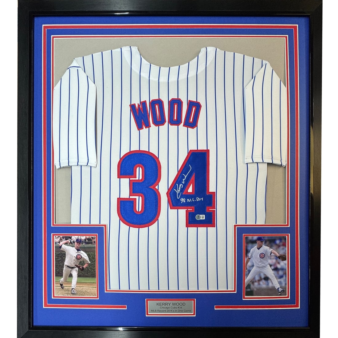 Framed Kerry Wood Autographed 98 ROY Pinstripe Jersey with Beckett COA: Framed Kerry Wood Autographed 98 ROY Pinstripe Jersey with Beckett COA Celebrate the legacy of Kerry Wood with this framed autographed 1998 Rookie of the Year pinstripe jersey. This impressive piece f