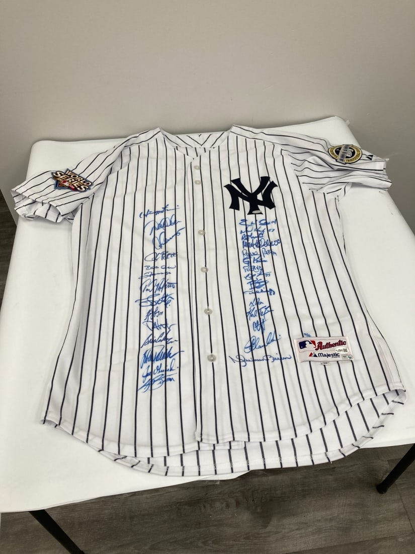 Steiner JSA authenticated 2009 Yankees championship signed jersey 5 of 6: Steiner JSA authenticated 2009 Yankees championship signed jersey 5 of 6 Limited-edition Derek Jeter New York Yankees pro-model 2009 World Series jersey signed on the front in blue Sharpie by twenty-n