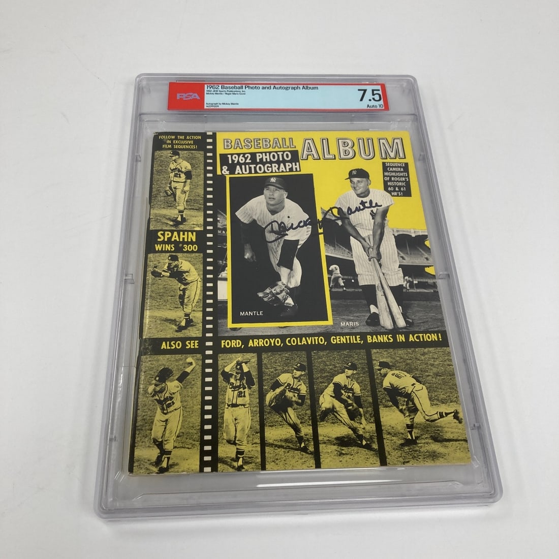 1962 Baseball Photo Album Signed by Mickey Mantle PSA 7.5 10 Auto: 1962 Baseball Photo Album Signed by Mickey Mantle PSA 7.5 10 Auto This is an original 1962 Baseball Magazine Photo Album featuring the New York Yankees, autographed by Mickey Mantle on the cover in ma