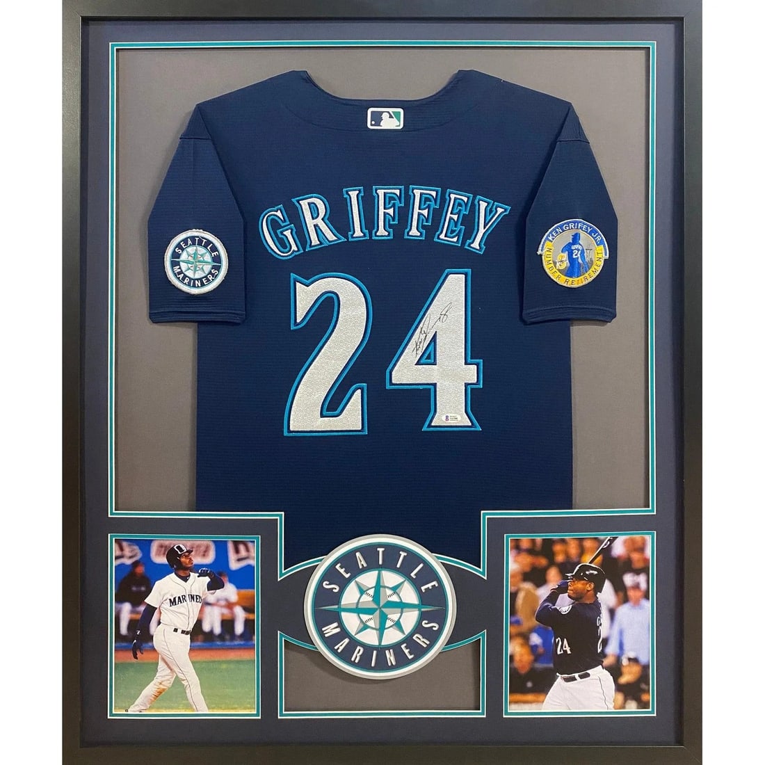 Framed Ken Griffey Jr. Autographed Mariners Jersey with Beckett Authentication: Framed Ken Griffey Jr. Autographed Mariners Jersey with Beckett Authentication This is a framed Seattle Mariners navy jersey signed by Ken Griffey Jr. The autograph has been authenticated by Beckett a