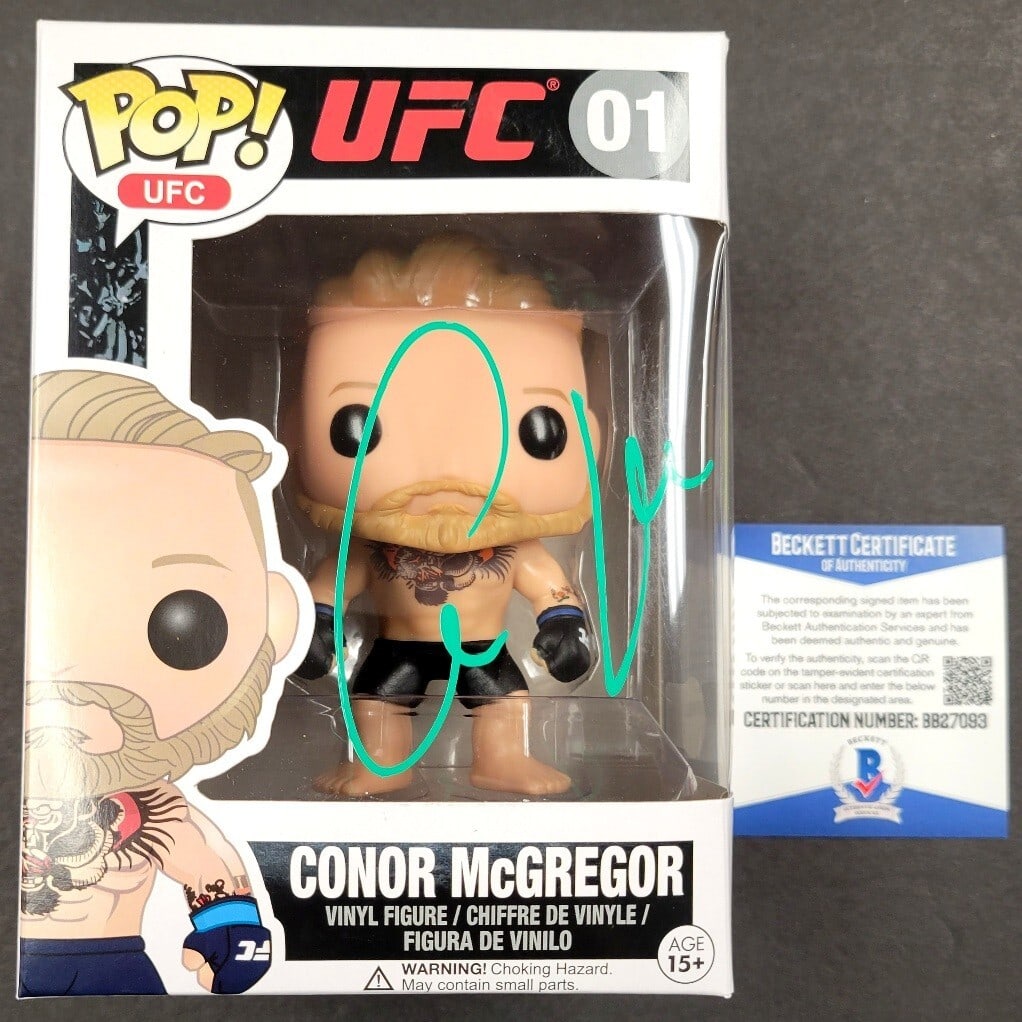Funko Pop UFC Figure Signed by Conor McGregor Beckett BAS Authenticated: Funko Pop UFC Figure Signed by Conor McGregor Beckett BAS Authenticated This Funko Pop collectible features Conor McGregor and has been hand-signed by the renowned MMA fighter. The autograph is authen