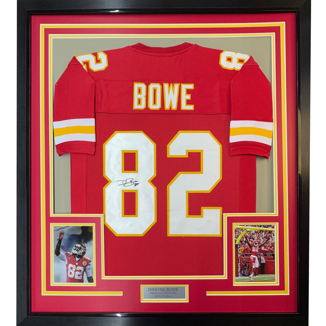 Framed Dwayne Bowe signed Kansas City Chiefs jersey JSA COA 33x42: Framed Dwayne Bowe signed Kansas City Chiefs jersey JSA COA 33x42 This professionally framed and matted Kansas City Chiefs red jersey features the authentic signature of NFL player Dwayne Bowe. The di