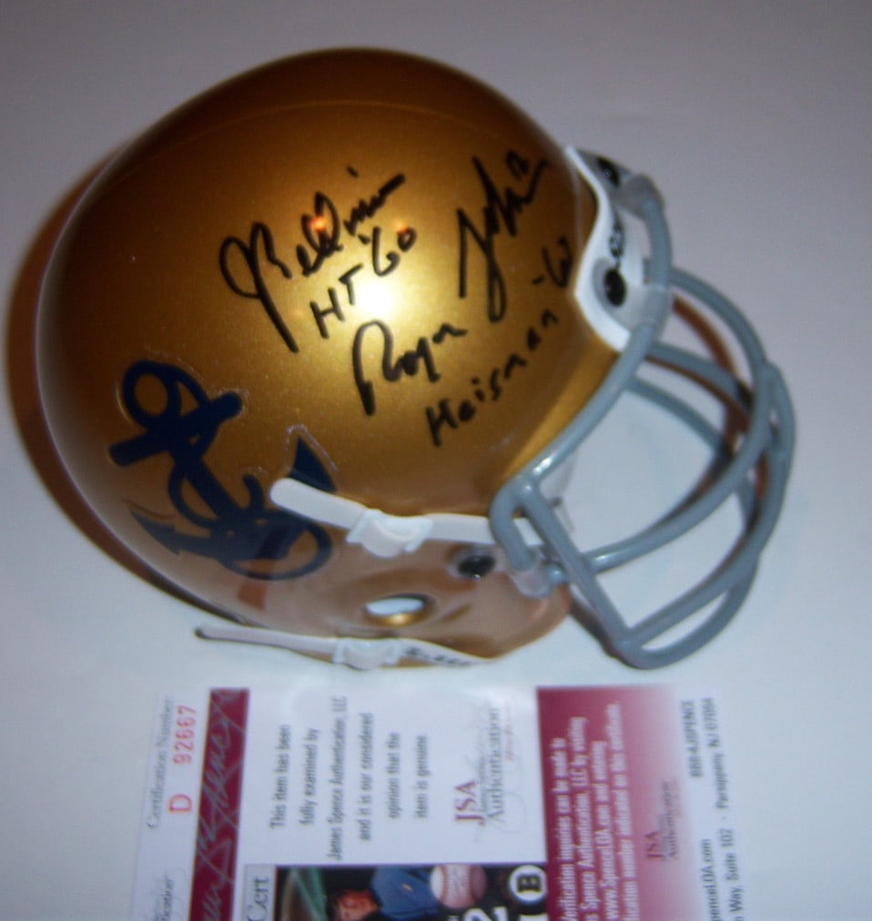 Signed Navy mini helmet Joe Bellino Roger Staubach JSA COA: Signed Navy mini helmet Joe Bellino Roger Staubach JSA COA This mini football helmet is signed by Joe Bellino and Roger Staubach, both Navy Heisman Trophy winners. The item is an original, not a repri
