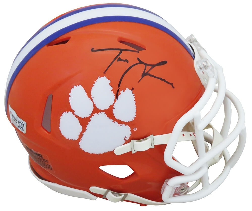 Trevor Lawrence Signed Clemson Tigers Mini Helmet Fanatics COA: Trevor Lawrence Signed Clemson Tigers Mini Helmet Fanatics COA Celebrate the legacy of Trevor Lawrence with this signed Clemson Tigers Riddell Speed mini helmet. This collectible helmet features an au