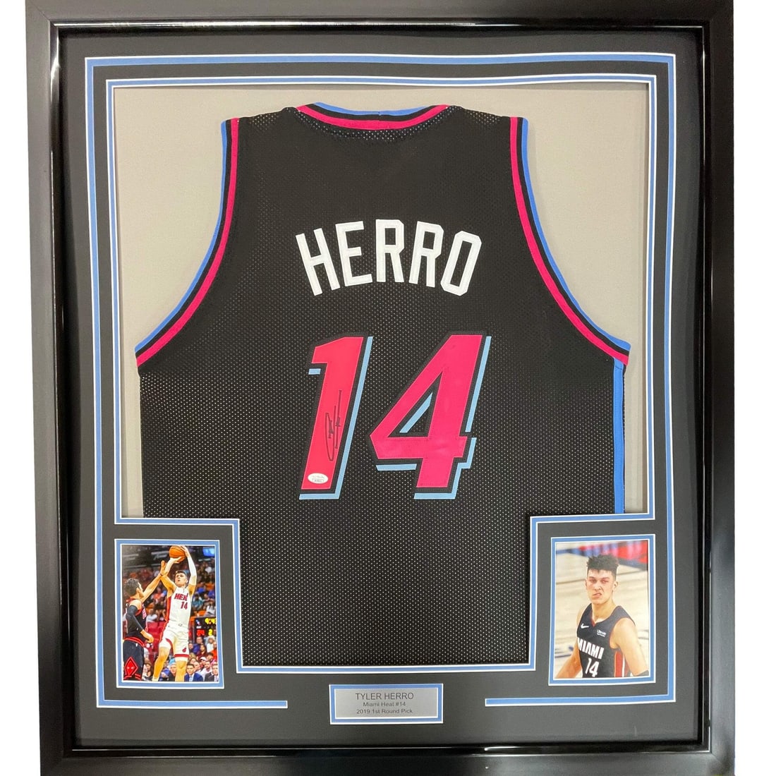 Tyler Herro signed framed Miami Heat Vice City jersey JSA: Tyler Herro signed framed Miami Heat Vice City jersey JSA Professionally framed and matted Tyler Herro Black Vice City jersey, signed and accompanied by JSA authentication. This original NBA memorabil