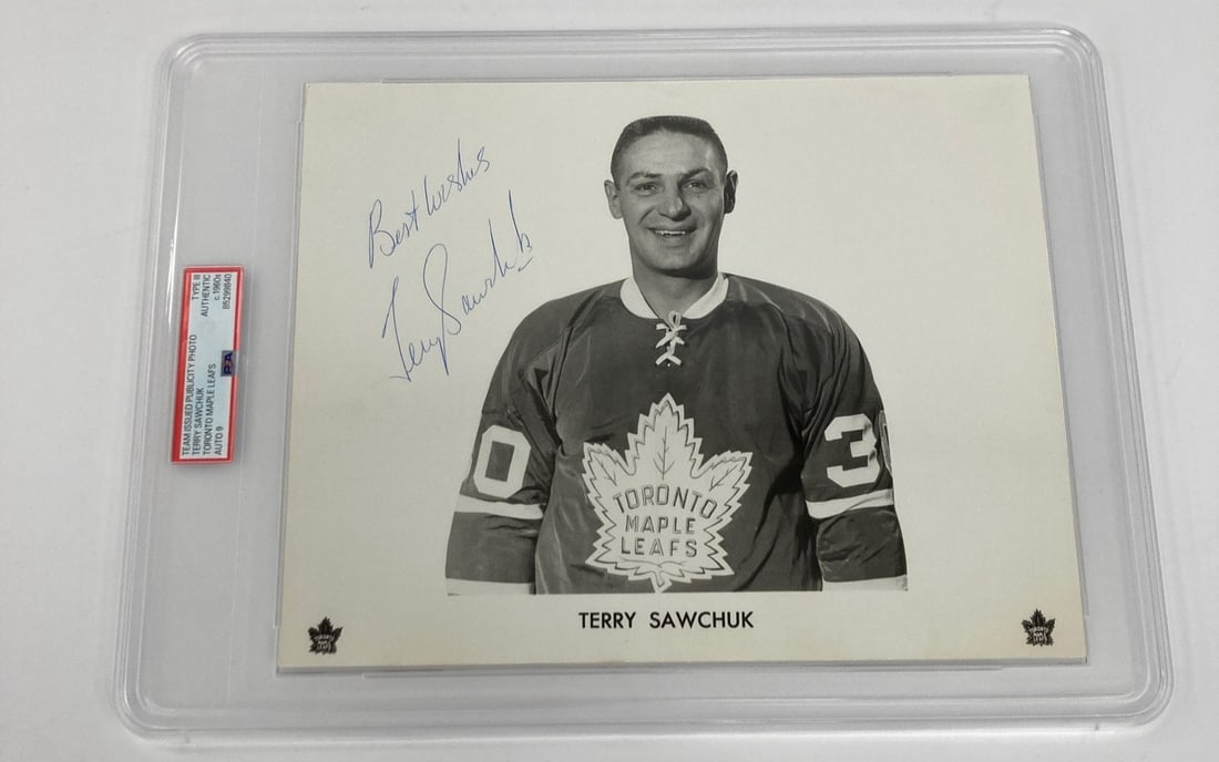PSA 9 Terry Sawchuk autographed 8x10 Toronto Maple Leafs team photo: PSA 9 Terry Sawchuk autographed 8x10 Toronto Maple Leafs team photo This is an original Type III 8x10 photo from the 1960s featuring Terry Sawchuk of the Toronto Maple Leafs. The photo is signed by Sa