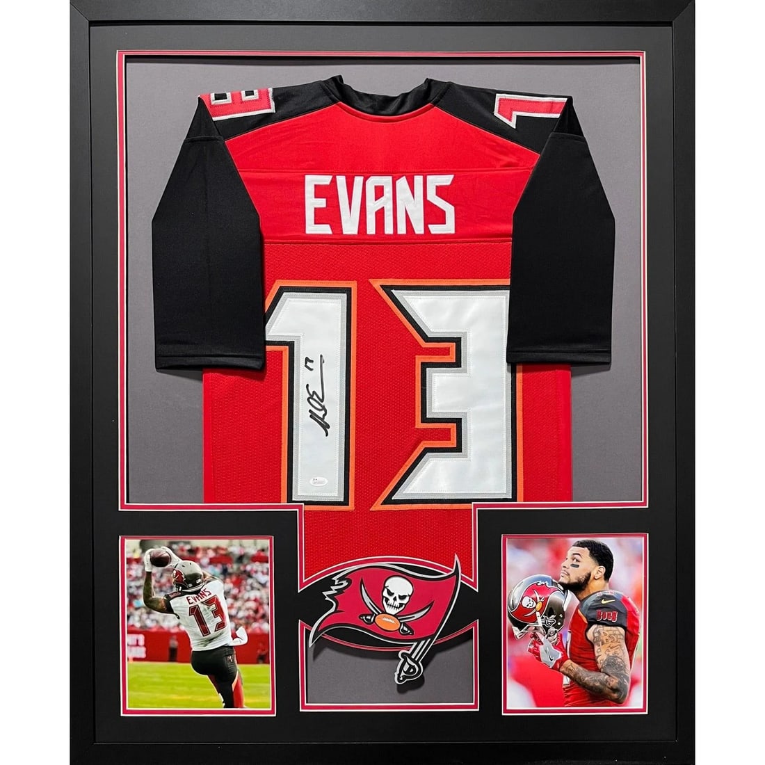 Mike Evans Autographed Framed Jersey Tampa Bay Buccaneers JSA Authentic: Mike Evans Autographed Framed Jersey Tampa Bay Buccaneers JSA Authentic This autographed framed jersey of Mike Evans, a standout player for the Tampa Bay Buccaneers, is an exceptional collectible. Aut