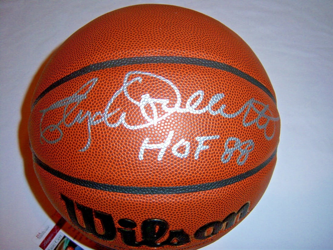 Signed Clyde Lovellette Basketball with JSA COA Hall of Fame Hawks Celtics: Signed Clyde Lovellette Basketball with JSA COA Hall of Fame Hawks Celtics This is a basketball autographed by Clyde Lovellette, a Hall of Famer who played for the Hawks and Celtics. The signature is 