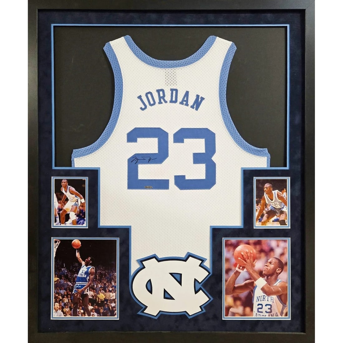 Michael Jordan Framed Signed UNC Jersey UDA Authenticated: Michael Jordan Framed Signed UNC Jersey UDA Authenticated This autographed Michael Jordan framed jersey is a must-have for any basketball enthusiast. Authenticated by Upper Deck Authenticated (UDA), k