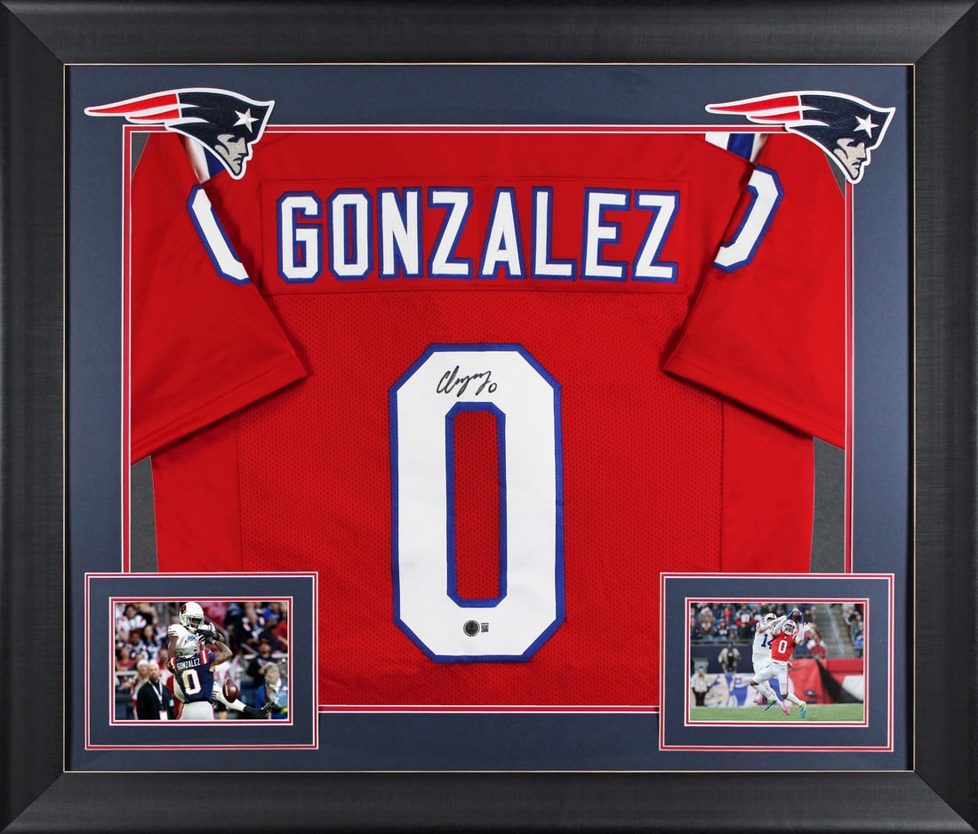 Framed Red Pro Style Jersey Signed by Christian Gonzalez Beckett Witnessed: Framed Red Pro Style Jersey Signed by Christian Gonzalez Beckett Witnessed This autographed red pro style framed jersey has been personally signed by Christian Gonzalez of the New England Patriots. It