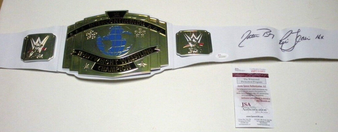 Ric Flair Autographed Wrestling Championship Belt with JSA COA: Ric Flair Autographed Wrestling Championship Belt with JSA COA This is a pre-owned Ric Flair "The Nature Boy" signed championship belt, commemorating his 16-time championship status. The item includes