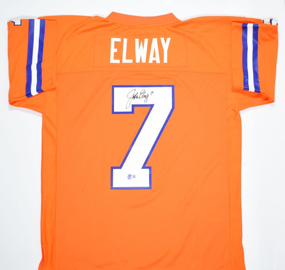 Autographed Mitchell Ness 1994 Legacy Broncos Jersey John Elway Beckett: Autographed Mitchell Ness 1994 Legacy Broncos Jersey John Elway Beckett This is an original John Elway signed Denver Broncos football jersey from Mitchell & Ness, styled in orange with a 1994 Legacy d