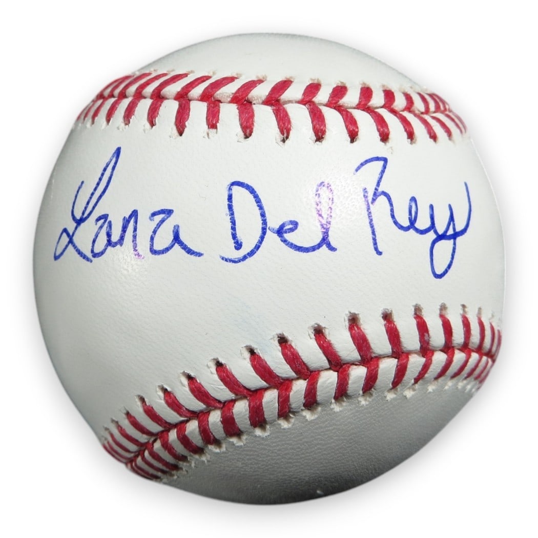 Autographed Baseball Featuring Lana Del Rey Signature with JSA Authentication: Autographed Baseball Featuring Lana Del Rey Signature with JSA Authentication This is an original baseball autographed by pop superstar Lana Del Rey. The signature has been authenticated by James Spen
