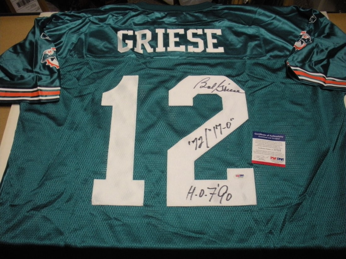 Signed Reebok Miami Dolphins Bob Griese HOF 90 Jersey JSA COA: Signed Reebok Miami Dolphins Bob Griese HOF 90 Jersey JSA COA This is an official licensed Reebok Miami Dolphins jersey, signed by Hall of Fame quarterback Bob Griese. The jersey is teal with "GRIESE"