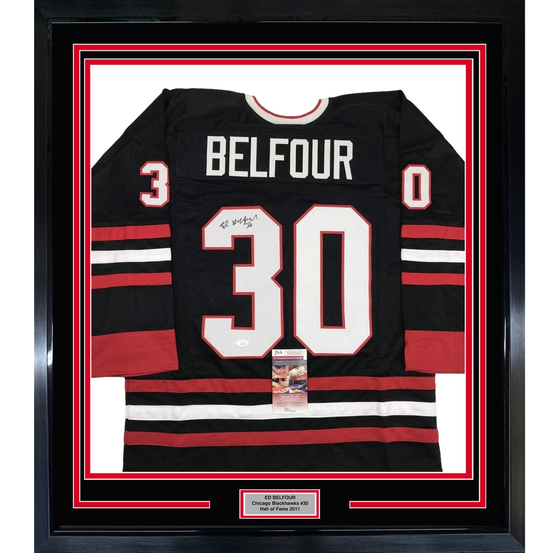 Ed Belfour Signed Chicago Blackhawks Jersey Framed JSA COA 35x39: Ed Belfour Signed Chicago Blackhawks Jersey Framed JSA COA 35x39 This professionally framed and matted display features an autographed Ed Belfour Chicago Blackhawks black hockey jersey. The jersey is 