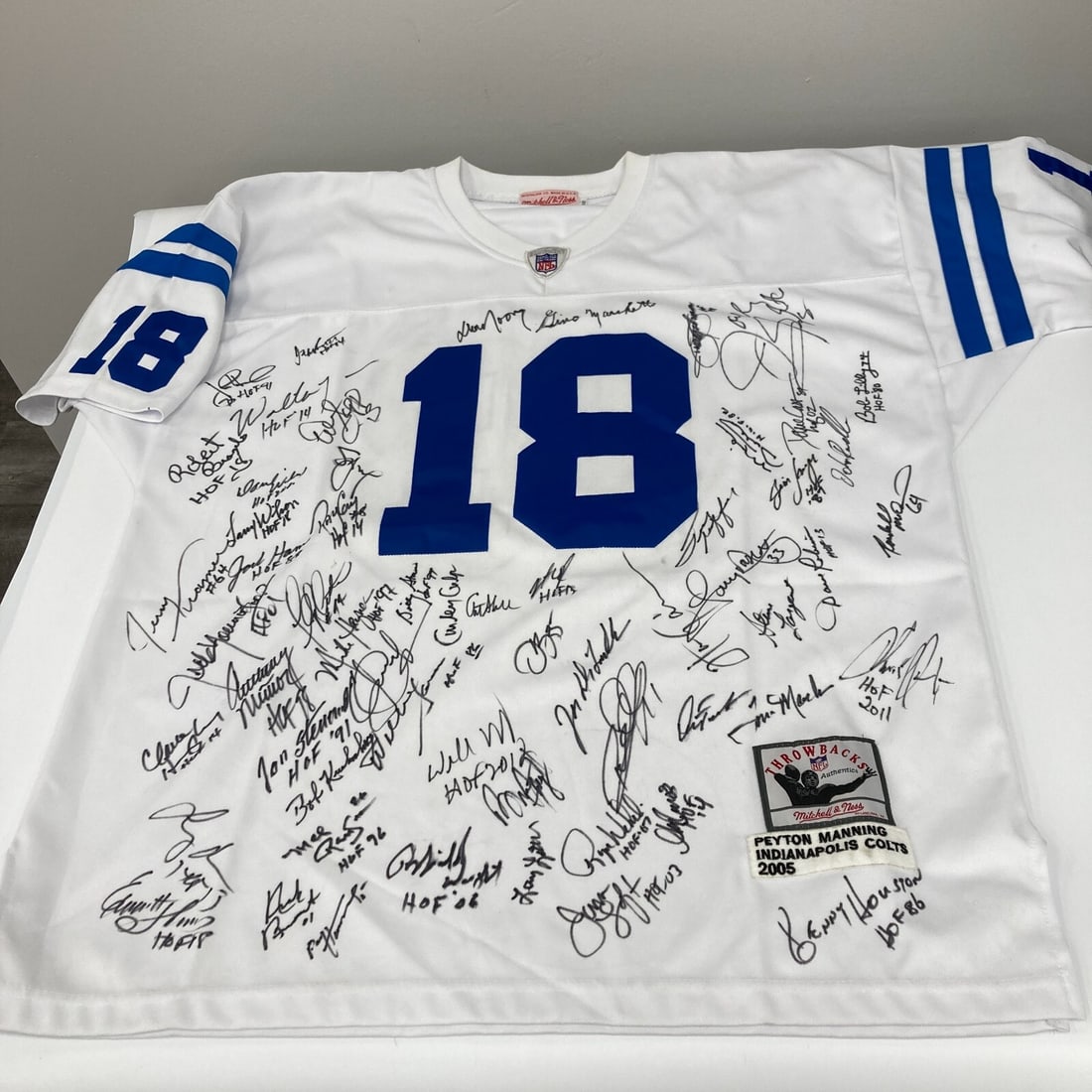 NFL Hall of Fame Multi Signed Jersey 50+ Signatures JSA COA: NFL Hall of Fame Multi Signed Jersey 50+ Signatures JSA COA This authentic Mitchell & Ness jersey is a collector's dream, featuring over 50 signatures from NFL Hall of Fame legends including Peyton Ma