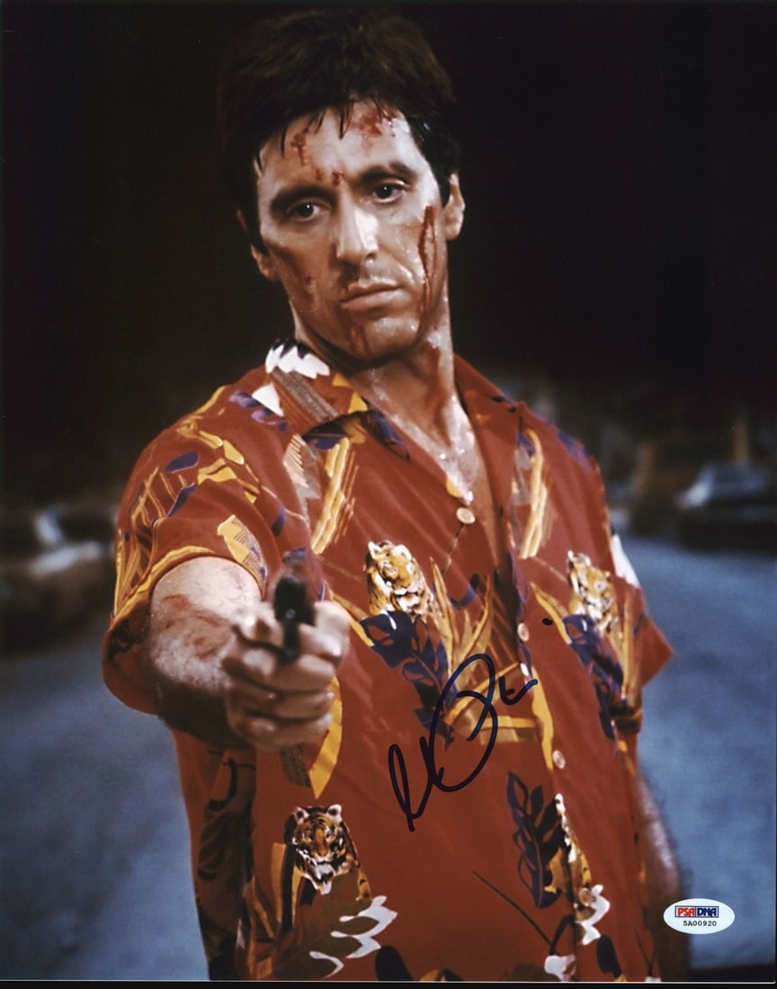 Al Pacino Scarface Signed 11x14 Photo Gem Mint 10 PSA Authenticated: Al Pacino Scarface Signed 11x14 Photo Gem Mint 10 PSA Authenticated This stunning 11x14 vertical photograph features a bold autograph from Al Pacino, renowned for his iconic role in "Scarface." Graded