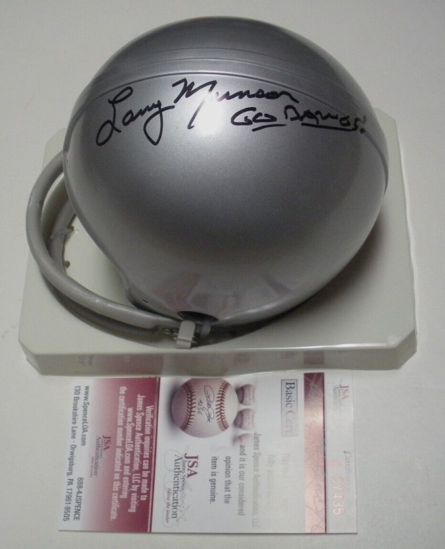 Larry Munson Signed Georgia Bulldogs Mini Helmet with JSA COA: Larry Munson Signed Georgia Bulldogs Mini Helmet with JSA COA Showcase your team spirit with this authentic Georgia Bulldogs mini helmet, signed by renowned sports broadcaster Larry Munson. This origi