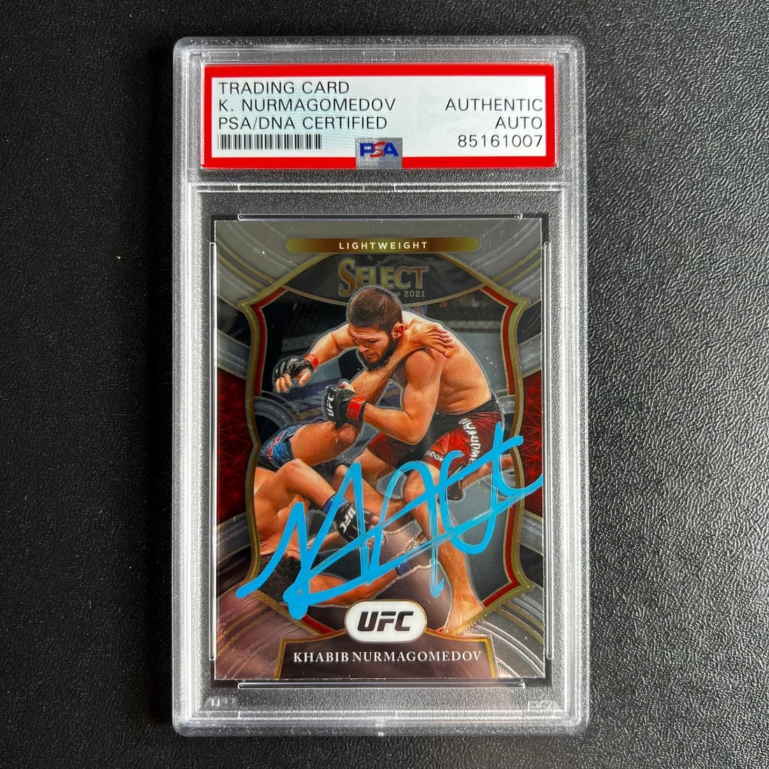 PSA Slabbed Khabib Nurmagomedov Autographed 2021 Panini Select UFC Card #47: PSA Slabbed Khabib Nurmagomedov Autographed 2021 Panini Select UFC Card #47 This is a 2021 Panini Select #47 sports trading card featuring Khabib Nurmagomedov. The card is from the Ultimate Fighting C