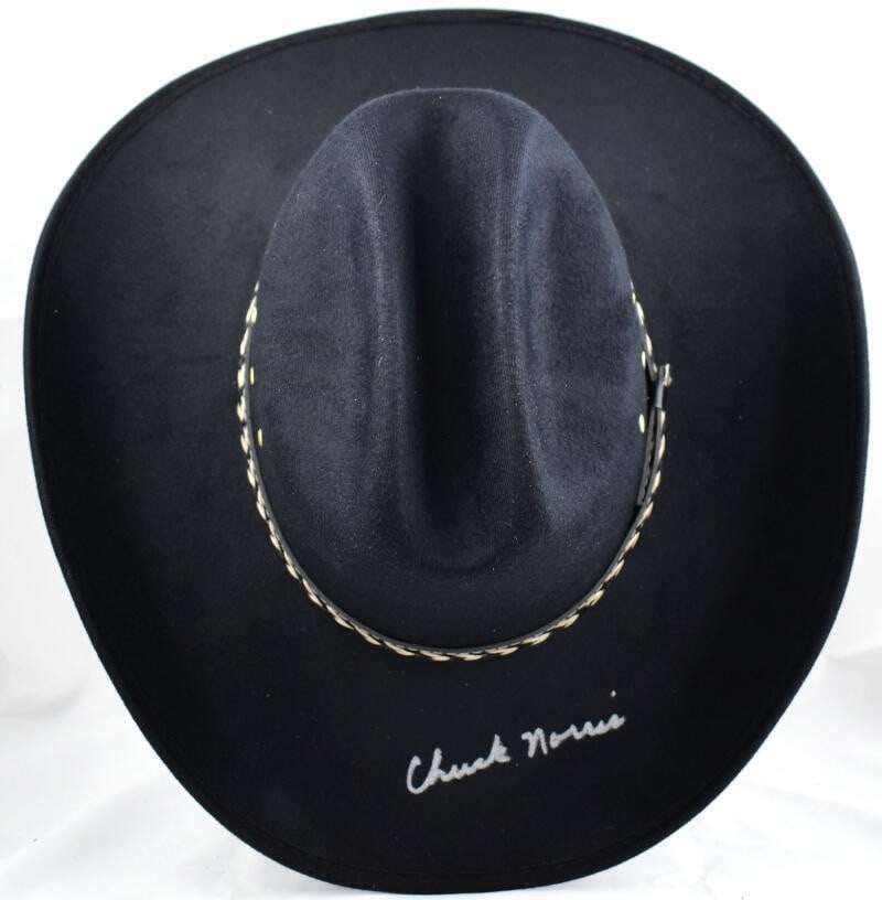 Black Cowboy Hat Signed by Chuck Norris with JSA Authentication: Black Cowboy Hat Signed by Chuck Norris with JSA Authentication This black cowboy hat features the autograph of Chuck Norris, making it a unique collectible. It comes from the United States and is in 