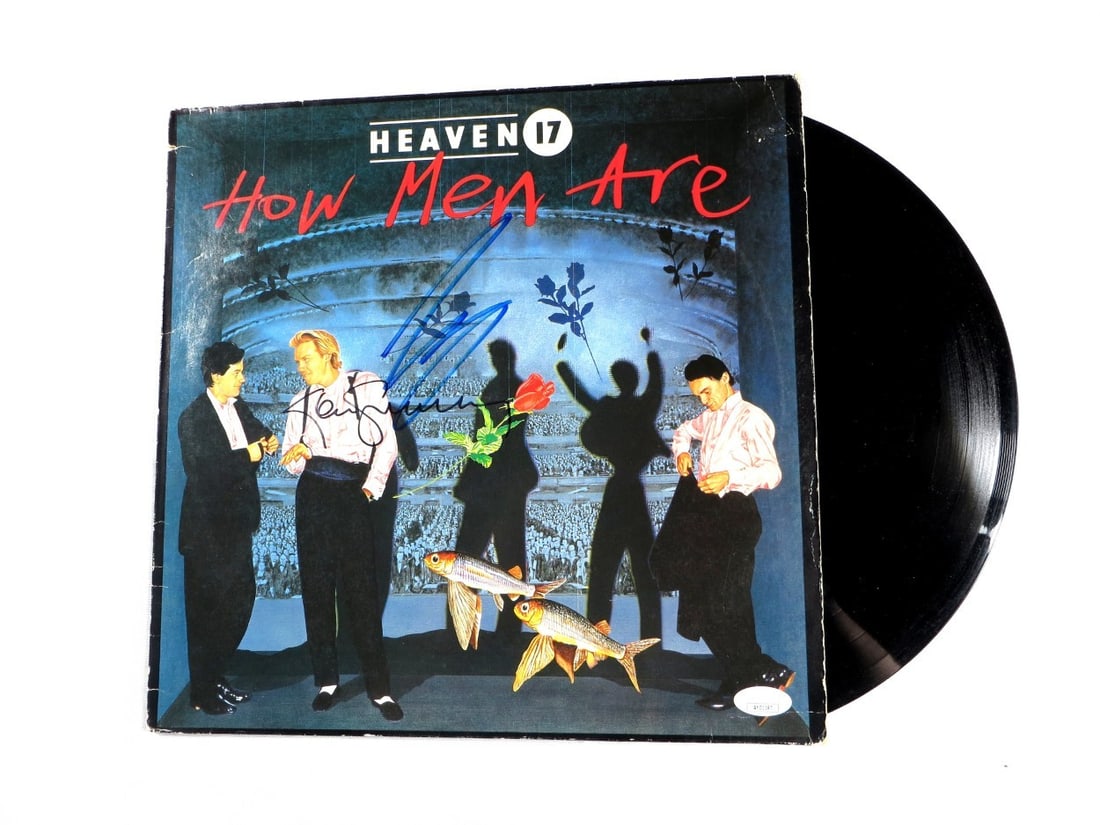 Heaven 17 Autographed Record Album Cover by Martyn Ware Glenn Gregory JSA: Heaven 17 Autographed Record Album Cover by Martyn Ware Glenn Gregory JSA This is an original autographed record album cover from the iconic band Heaven 17, featuring signatures from members Martyn Wa
