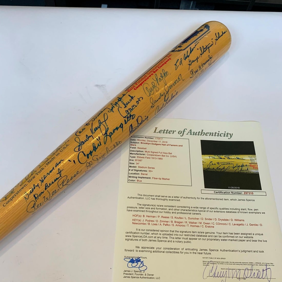Brooklyn Dodgers Legends Bat With Over 50 Autographs JSA Authenticated: Brooklyn Dodgers Legends Bat With Over 50 Autographs JSA Authenticated This original Cooperstown bat features over 50 bold signatures from legendary Brooklyn Dodgers Hall of Famers and greats, includi