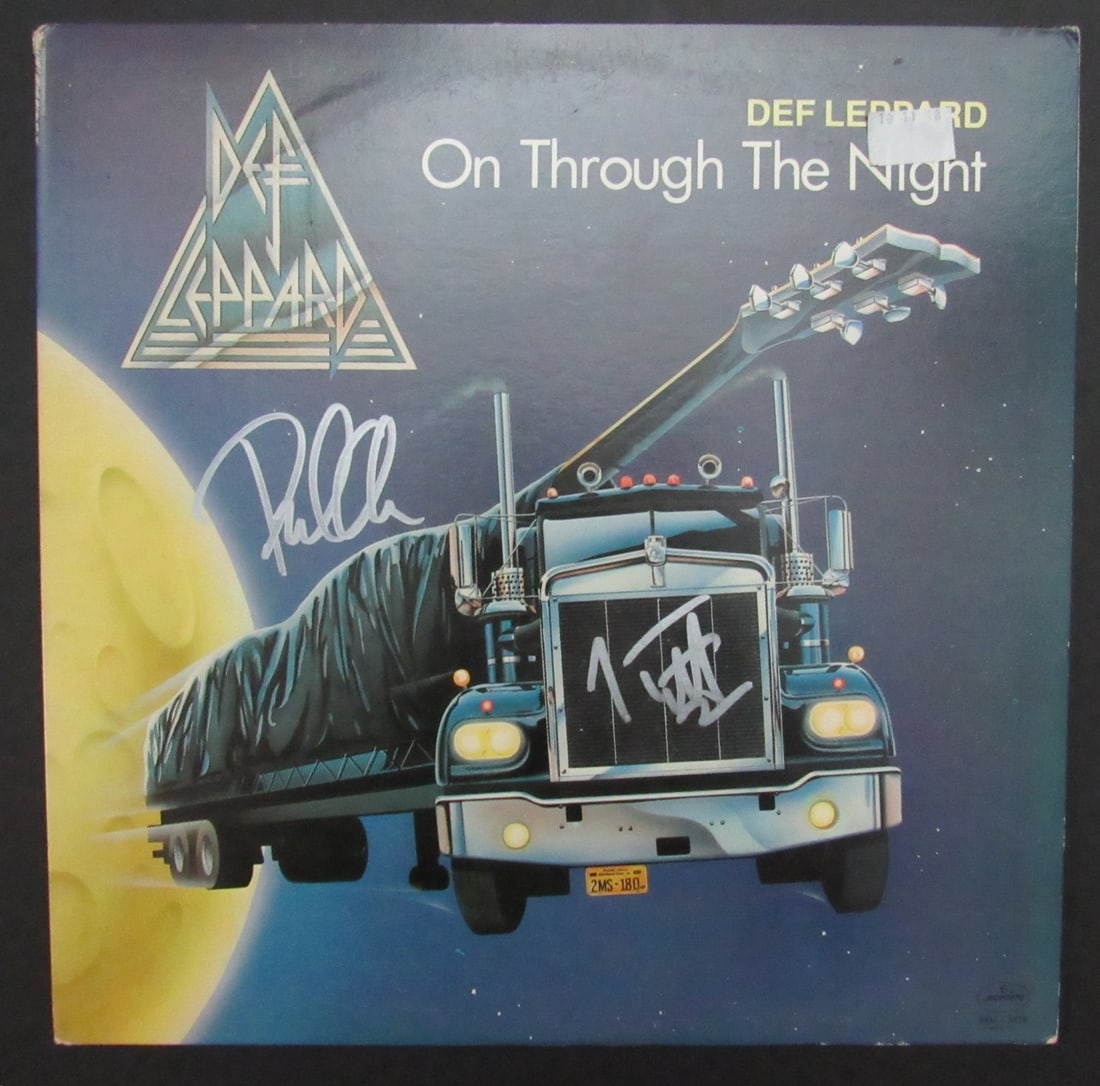 Def Leppard Signed Album On Through the Night JSA Authenticated: Def Leppard Signed Album On Through the Night JSA Authenticated This is a Def Leppard album titled "On Through the Night," featuring dual signatures from band members Joe Elliott and Phil Collen. The 