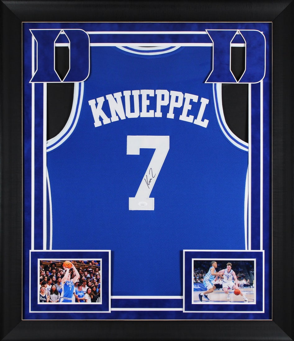 Framed Blue Pro Style Jersey Signed by Kon Knueppel JSA: Framed Blue Pro Style Jersey Signed by Kon Knueppel JSA This autographed blue pro style framed jersey has been personally signed by Kon Knueppel of the Duke Blue Devils. It is an original item with JS