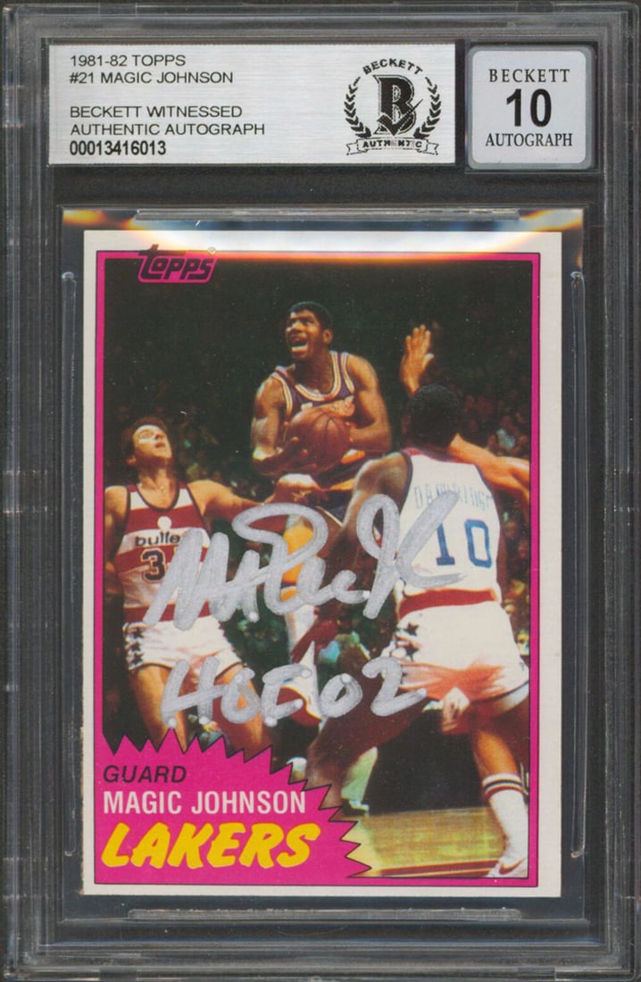 Magic Johnson signed 1981 Topps 21 card HOF 02 Beckett Auto 10: Magic Johnson signed 1981 Topps 21 card HOF 02 Beckett Auto 10 Autographed 1981 Topps #21 basketball card featuring Magic Johnson of the Los Angeles Lakers with the inscription "HOF 02." The card is g
