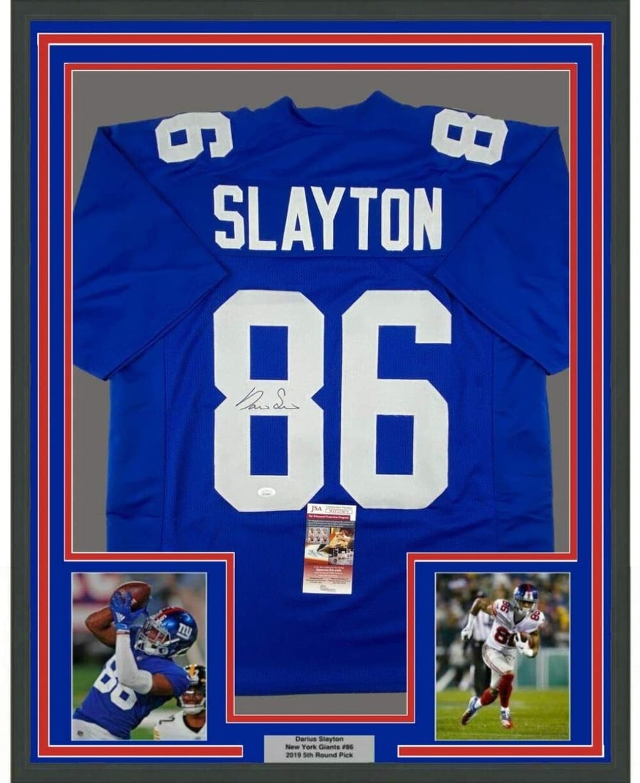 Darius Slayton signed framed New York Giants jersey JSA COA 33x42: Darius Slayton signed framed New York Giants jersey JSA COA 33x42 This professionally framed and matted New York Giants blue jersey is autographed by Darius Slayton. The display includes two 8x10 phot