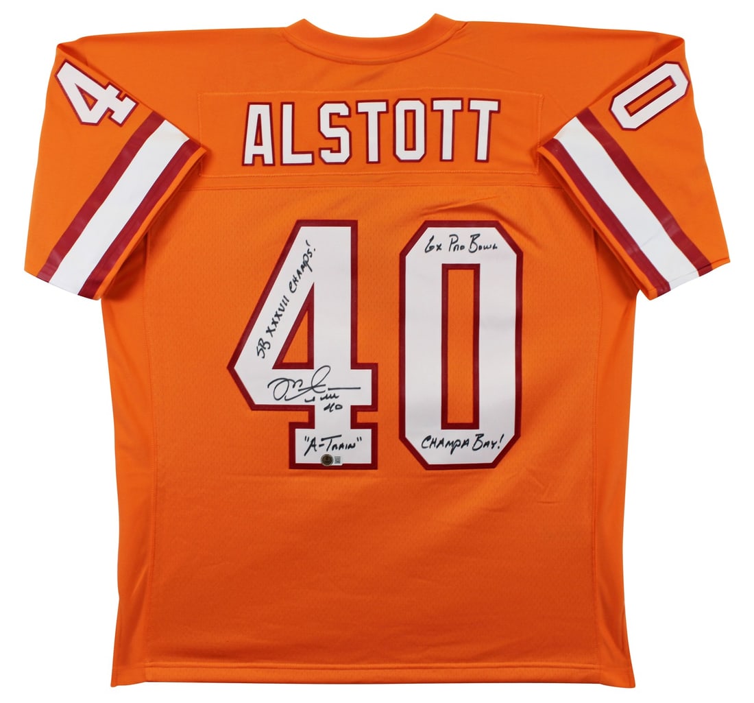 Mike Alstott Signed Orange Buccaneers Jersey with Inscriptions BAS Authenticated: Mike Alstott Signed Orange Buccaneers Jersey with Inscriptions BAS Authenticated Celebrate the legacy of Mike Alstott with this authentic signed orange Mitchell & Ness throwback jersey from the Tampa 