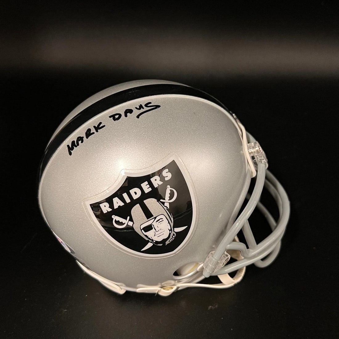PSA DNA authenticated Mark Davis Oakland Raiders mini helmet: PSA DNA authenticated Mark Davis Oakland Raiders mini helmet This is an Oakland Raiders mini helmet autographed by team owner Mark Davis. The signature has been authenticated by PSA/DNA, ensuring its 