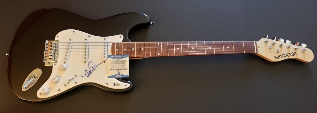 Electric Guitar Signed by Kevin Bacon Beckett Authenticated Footloose: Electric Guitar Signed by Kevin Bacon Beckett Authenticated Footloose This electric guitar and accompanying guitar pick have been hand signed by Kevin Bacon. The authenticity of the autograph is verif