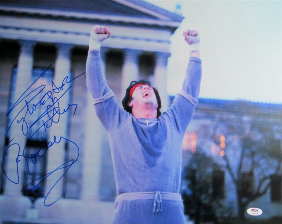 Sylvester Stallone Signed 16X20 Rocky Photo PSA Authenticated: Sylvester Stallone Signed 16X20 Rocky Photo PSA Authenticated Own a piece of cinematic history with this Sylvester Stallone signed 16x20 photograph from the iconic film Rocky. This original photograph
