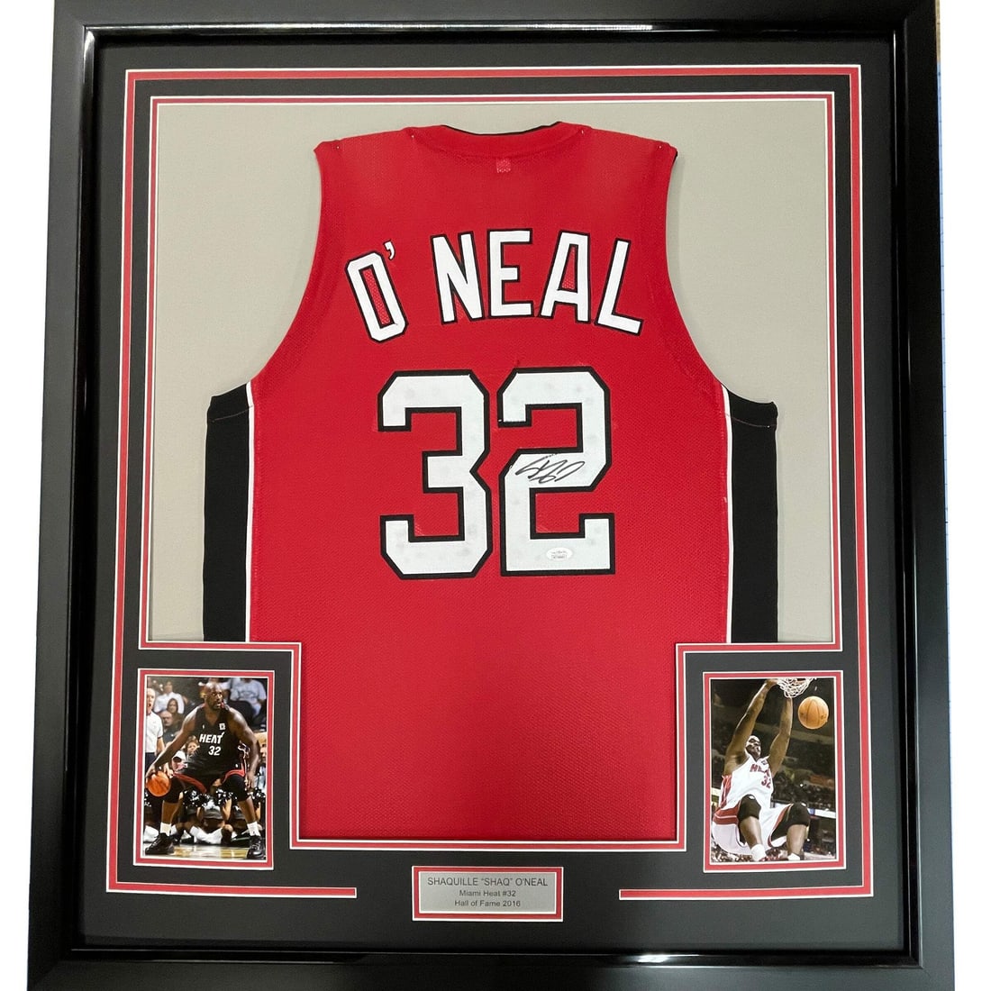 Framed Autographed Shaquille O'Neal Miami Heat Jersey with JSA COA: Framed Autographed Shaquille O'Neal Miami Heat Jersey with JSA COA Celebrate the legacy of basketball legend Shaquille O'Neal with this professionally framed and autographed Miami Heat jersey. This st
