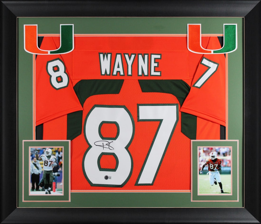 Framed Orange Football Jersey Reggie Wayne Signed Miami Hurricanes Beckett Authenticated: Framed Orange Football Jersey Reggie Wayne Signed Miami Hurricanes Beckett Authenticated This is an original autographed orange pro style framed football jersey personally signed by Reggie Wayne of th