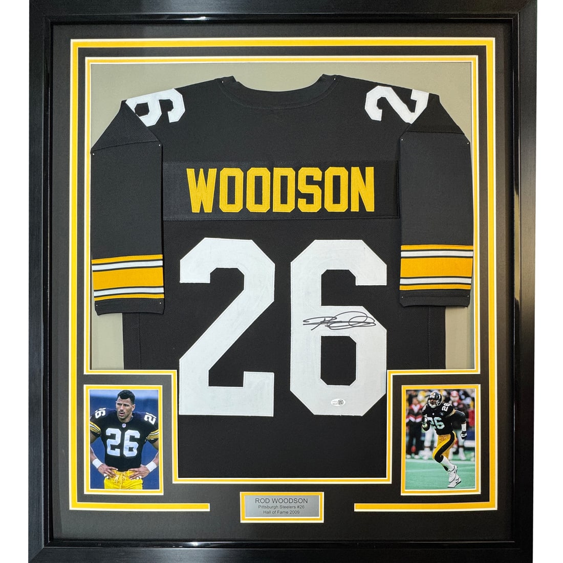 Rod Woodson signed framed Pittsburgh Steelers black jersey 35x39 JSA: Rod Woodson signed framed Pittsburgh Steelers black jersey 35x39 JSA Professionally framed and matted autographed Rod Woodson Pittsburgh black jersey display. This original signed piece includes two 5