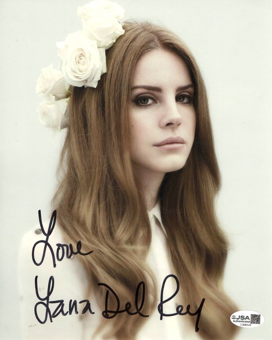 Lana Del Rey 8x10 Photograph Signed with JSA Authentication: Lana Del Rey 8x10 Photograph Signed with JSA Authentication This is an autographed 8x10 photograph featuring Lana Del Rey with flowers in her hair. The photo is hand-signed and authenticated by James 