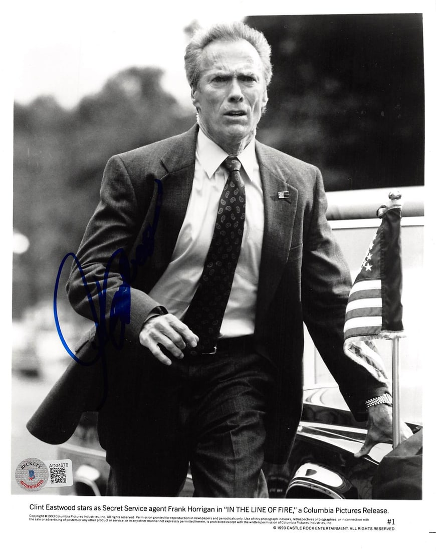 Clint Eastwood Signed 8x10 Photo In The Line Of Fire BAS Certified: Clint Eastwood Signed 8x10 Photo In The Line Of Fire BAS Certified Capture a piece of cinematic history with this authentic signed 8x10 black and white photograph of Clint Eastwood from the iconic fil