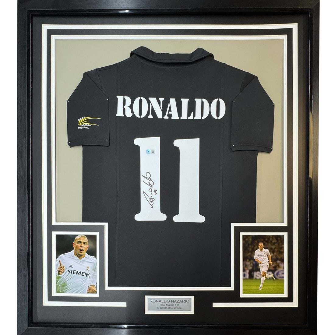 Framed Ronaldo Nazario Signed Real Madrid Jersey with Beckett COA: Framed Ronaldo Nazario Signed Real Madrid Jersey with Beckett COA This stunning framed autographed jersey features the legendary Ronaldo Nazario of Real Madrid. Measuring 35x39 inches, this display is