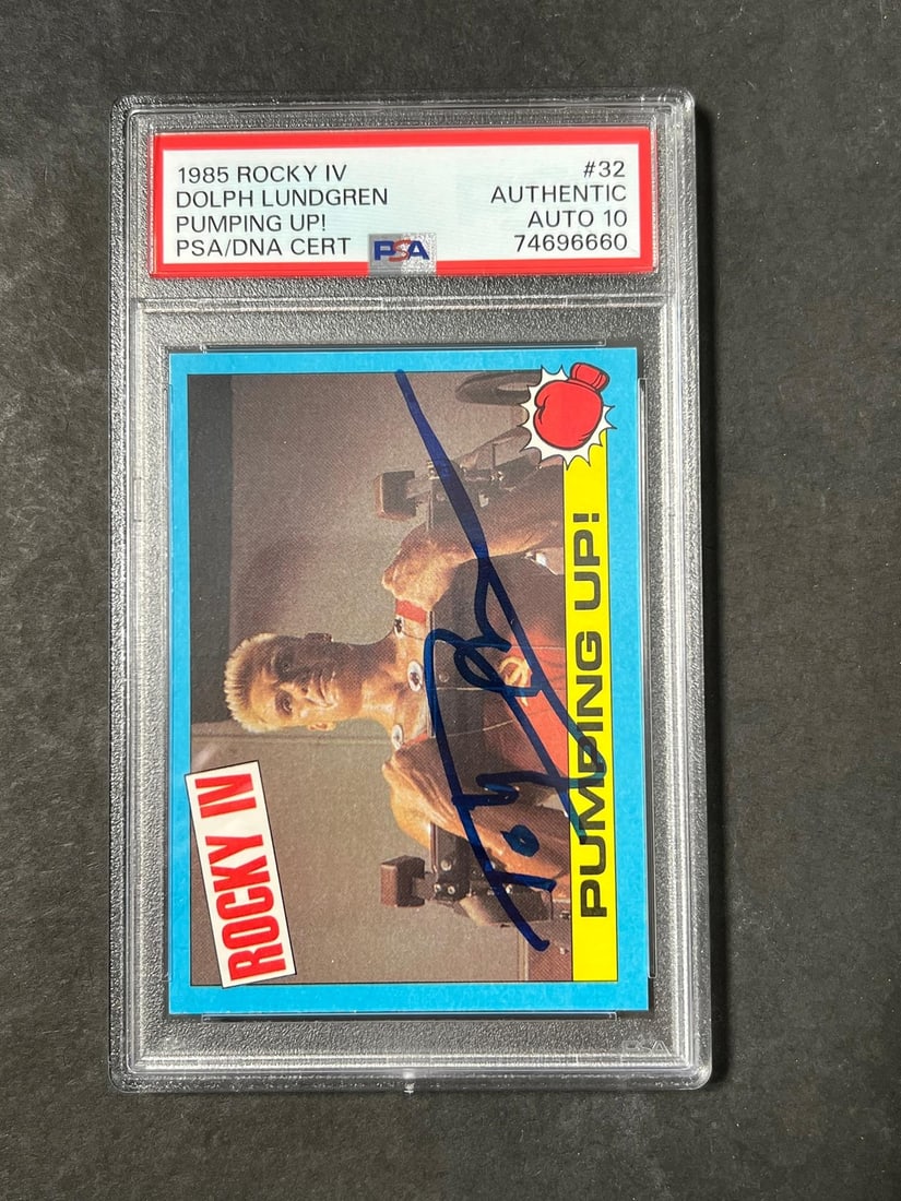 1985 Topps Rocky IV #32 Dolph Lundgren Autographed PSA 10 Card: 1985 Topps Rocky IV #32 Dolph Lundgren Autographed PSA 10 Card This is a 1985 Topps Rocky IV trading card featuring a signature from Dolph Lundgren, who portrayed Ivan Drago in the iconic film. The ca
