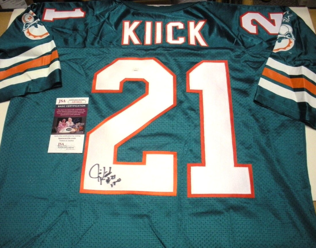 Jim Kiick Autographed Miami Dolphins Starter Jersey with 17-0 Inscription and JSA COA: Jim Kiick Autographed Miami Dolphins Starter Jersey with 17-0 Inscription and JSA COA This is a pre-owned, officially licensed Miami Dolphins Starter jersey signed by Jim Kiick, commemorating the Dolp