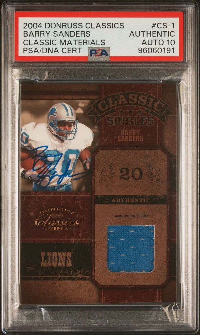 2004 Donruss Classics Barry Sanders Signed Card PSA Authenticated #CS-1: 2004 Donruss Classics Barry Sanders Signed Card PSA Authenticated #CS-1 This 2004 Donruss Classics Classic Materials #CS-1 trading card features the legendary Barry Sanders, a hallmark of NFL history.